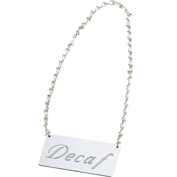 A silver chain sign that says "Decaf"