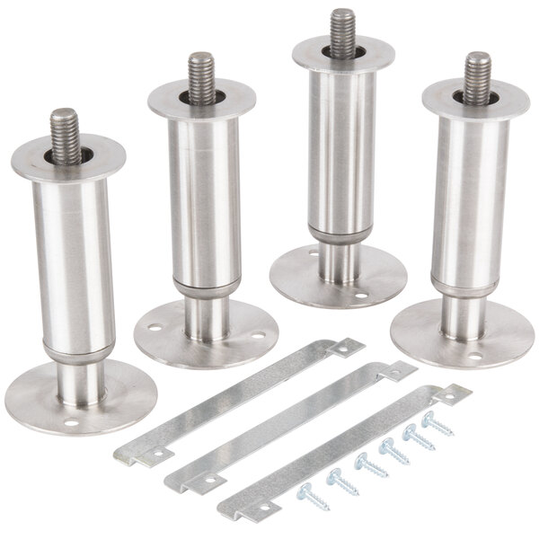Three Manitowoc stainless steel flanged feet with screws.