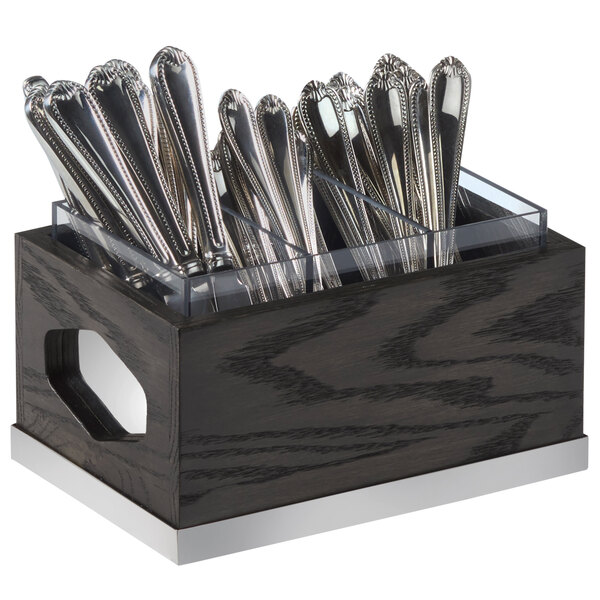 A black wooden Cal-Mil Cinderwood flatware organizer with silverware inside.