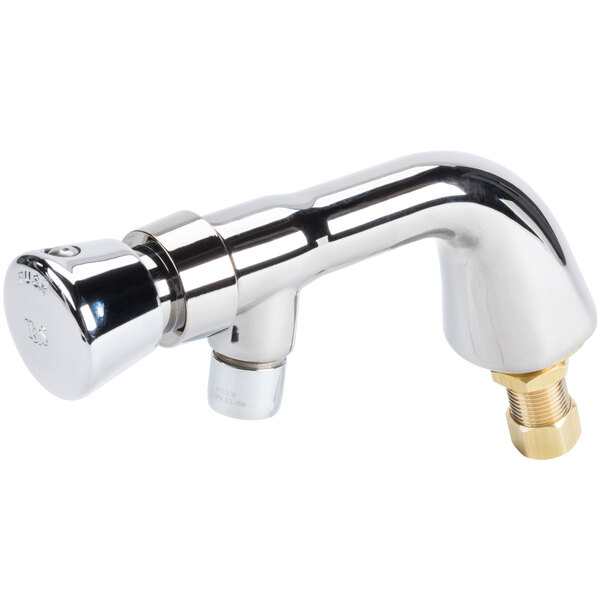 A chrome plated T&S metering faucet with a gold nut.