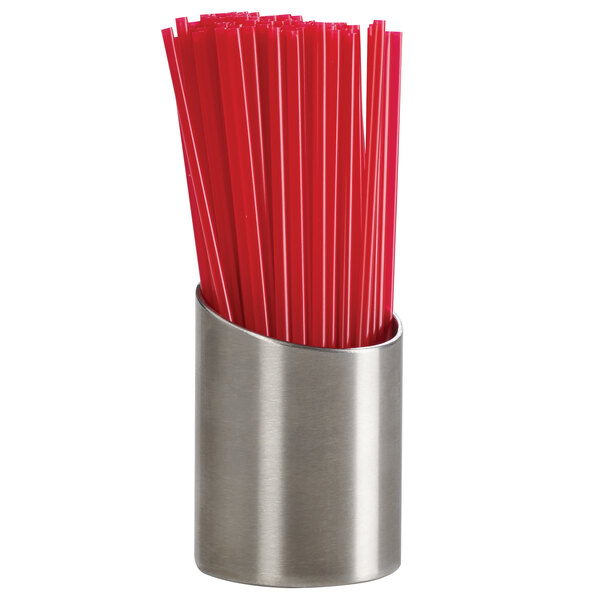 A silver metal Cal-Mil straw holder with red straws inside.