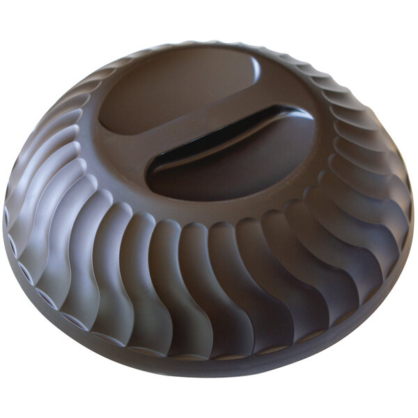 A black circular Dinex Turnbury insulated meal delivery dome with a curved wavy design.