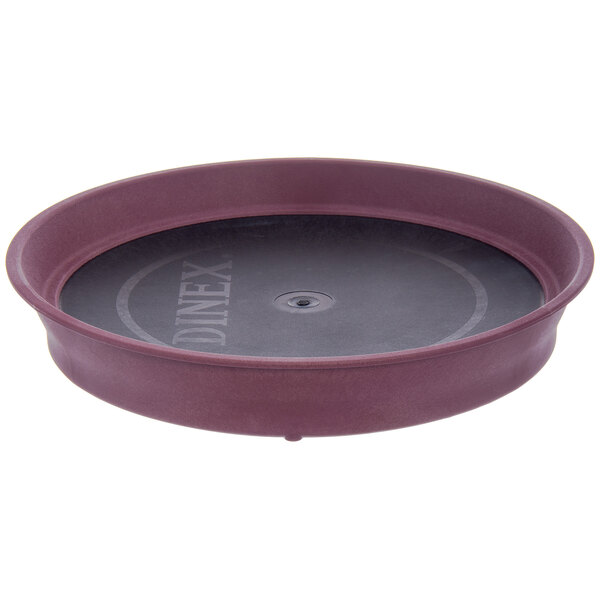 A round purple and black Dinex induction base.