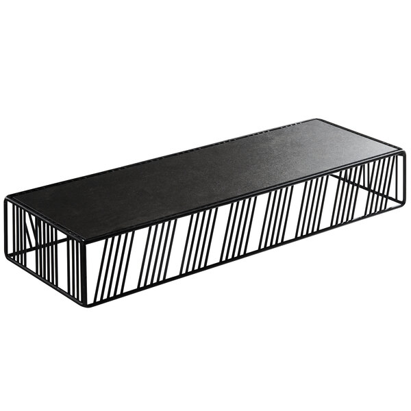 A black metal rectangular riser with a black surface.