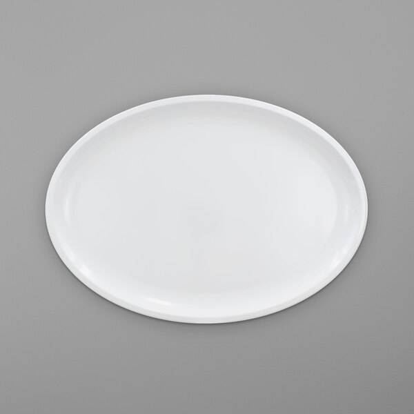 A white oval melamine platter with a round edge on a white surface.