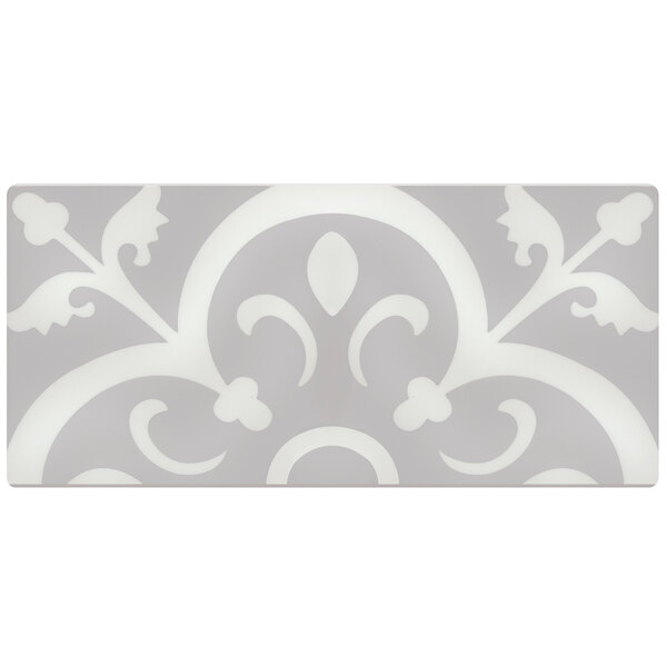 A grey and white rectangular melamine serving tile with a decorative design.