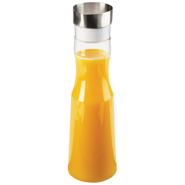 A clear Cal-Mil polycarbonate carafe with orange liquid inside.