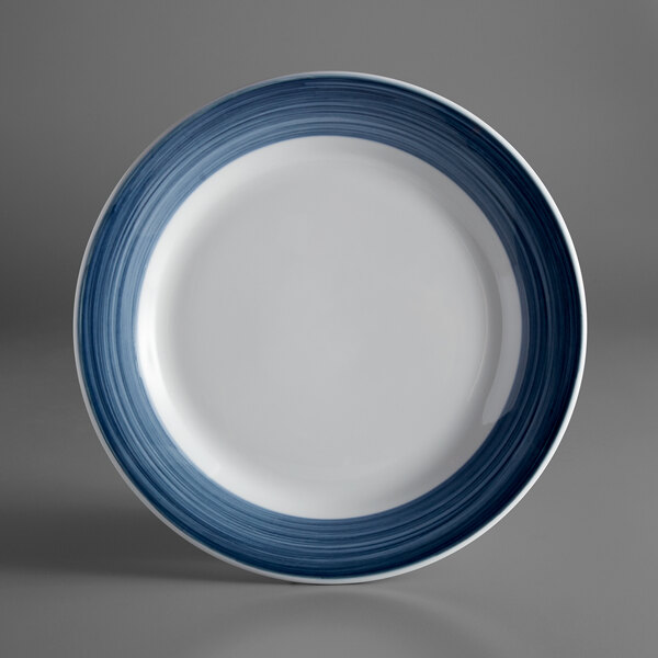A white porcelain plate with a steel blue band and white stars.