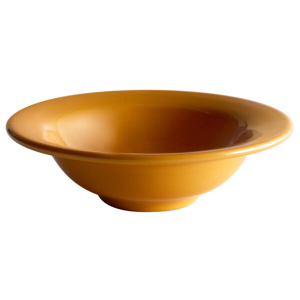 A close-up of a Libbey Saffron porcelain bowl with a yellow rim.
