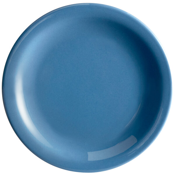 A blue Libbey porcelain plate with a white circle.