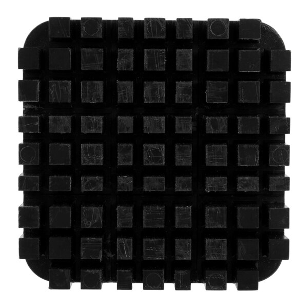 A black square push block with squares on it.