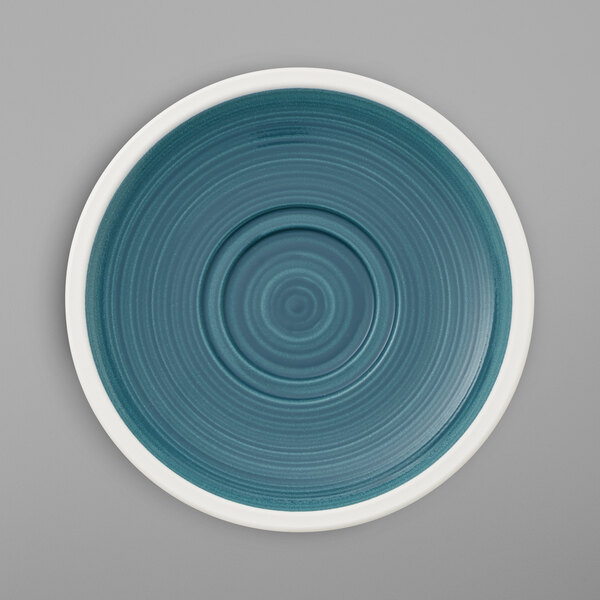 A blue and white Villeroy & Boch Artesano Ocean porcelain saucer.