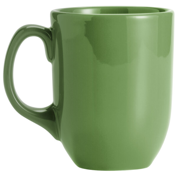 A green Libbey porcelain mug with a handle.