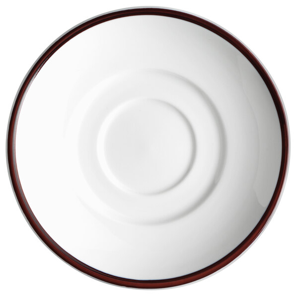 A white porcelain saucer with a brown rim.