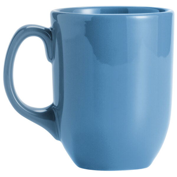 A close-up of a blue Libbey Cantina coffee mug with a handle.