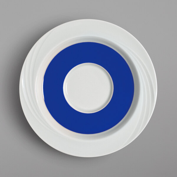 A white plate with a blue circle on it.