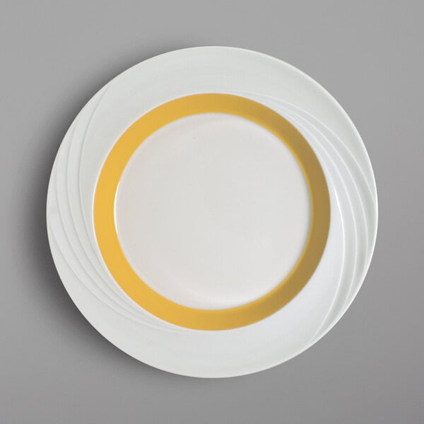 A white plate with a yellow rim.