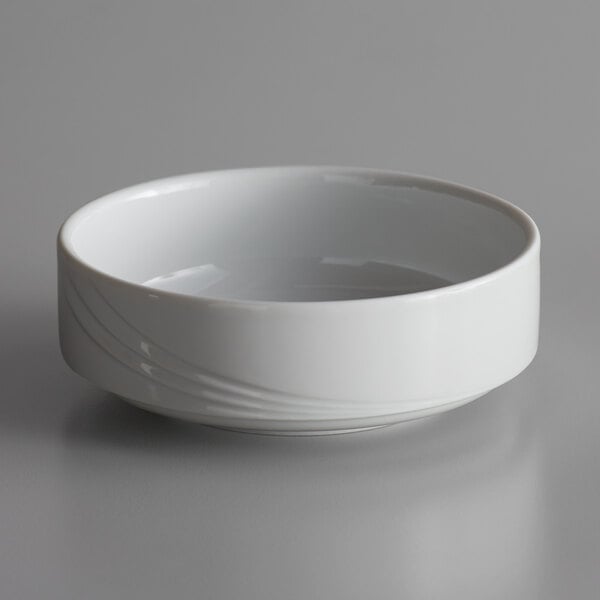 A white Schonwald porcelain bowl with a curved design.