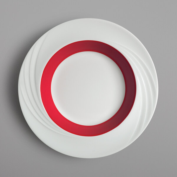 A white porcelain bowl with a red rim.
