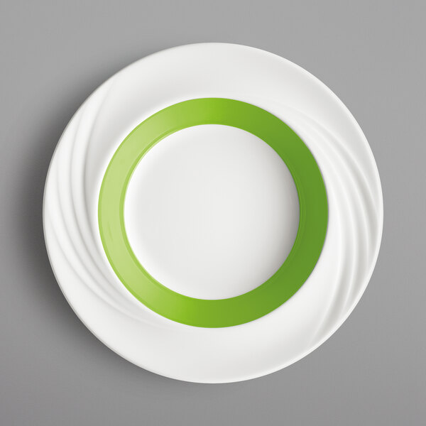 A white porcelain bowl with a green rim.