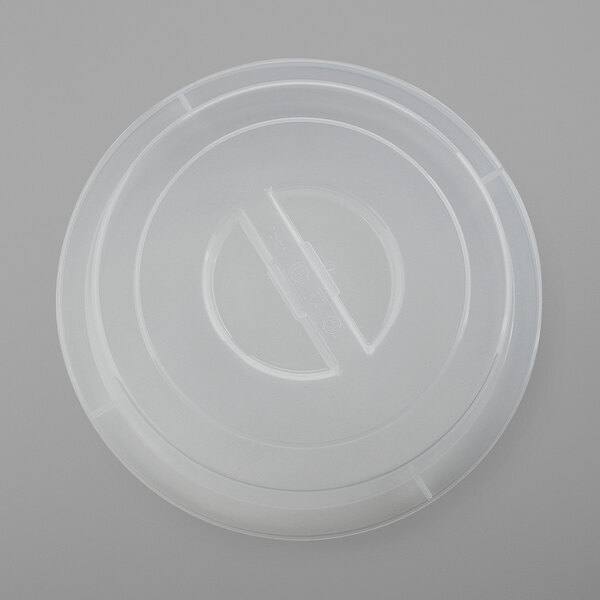 A Schonwald Donna Senior semi-translucent plastic lid with a circular hole over a plate.