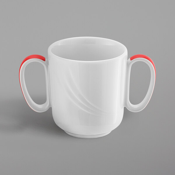 A white mug with red handles.