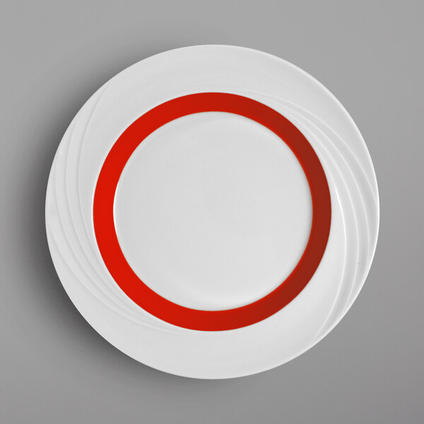 A white porcelain plate with a red rim.