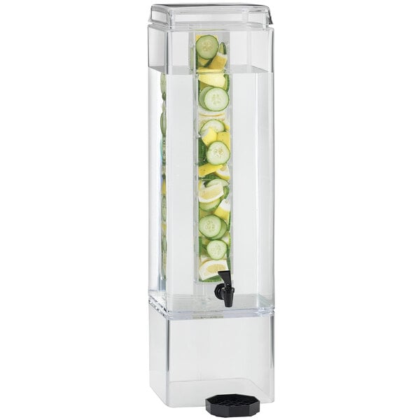 A Cal-Mil square acrylic infusion beverage dispenser filled with water and fruit.