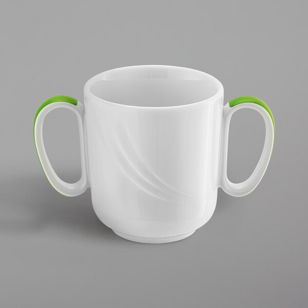 A white porcelain Schonwald mug with light green accents and two handles.