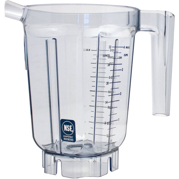 A clear plastic Vitamix blender jar with a handle and measuring cup.