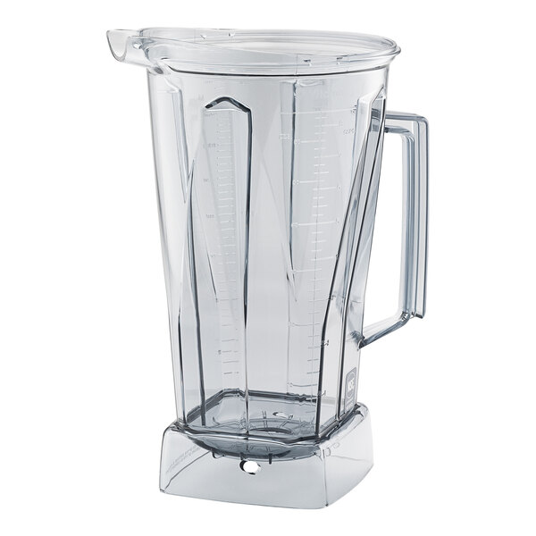 A clear plastic Vitamix blender container with a handle.