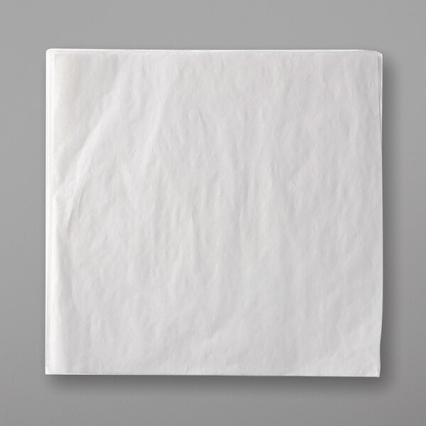 A white square GET Enterprises tissue liner.