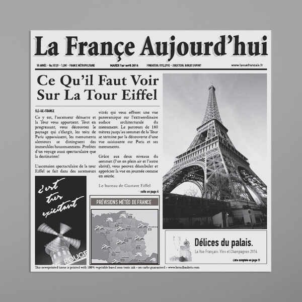 A white French newsprint double-open bag with a picture of the Eiffel Tower.