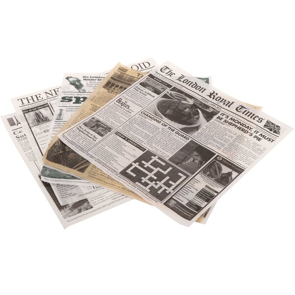 A variety of newsprint liners on a counter.