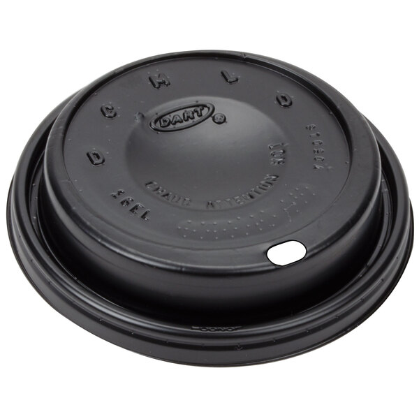 A black plastic Dart travel lid with a hole.