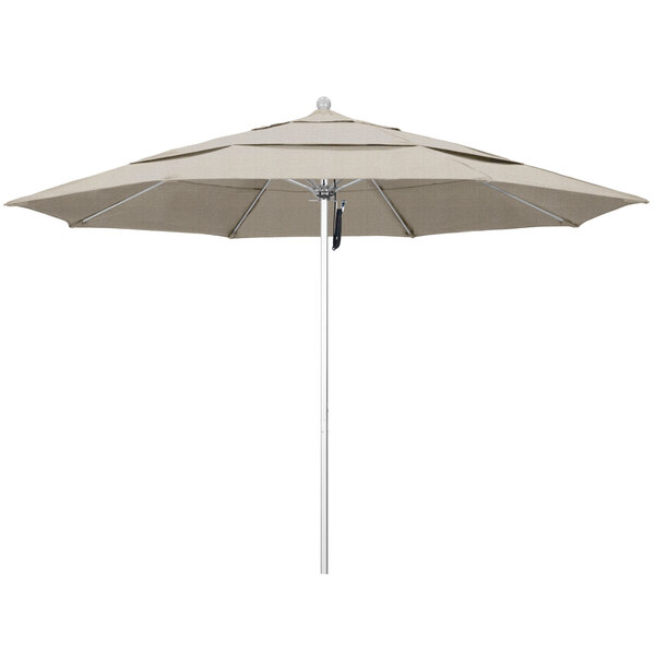 A California Umbrella ALTO Olefin outdoor table umbrella with a woven granite canopy.