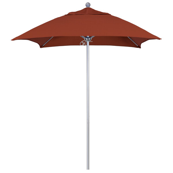 A red California Umbrella on a silver metal pole with terracotta fabric.