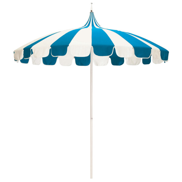 A California Umbrella with a white pagoda canopy with blue stripes and a white pole.