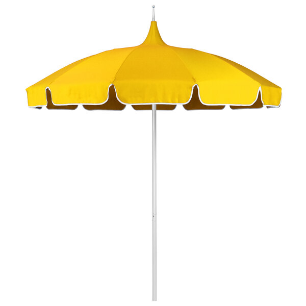 A California Umbrella with a yellow Sunbrella canopy and white trim.