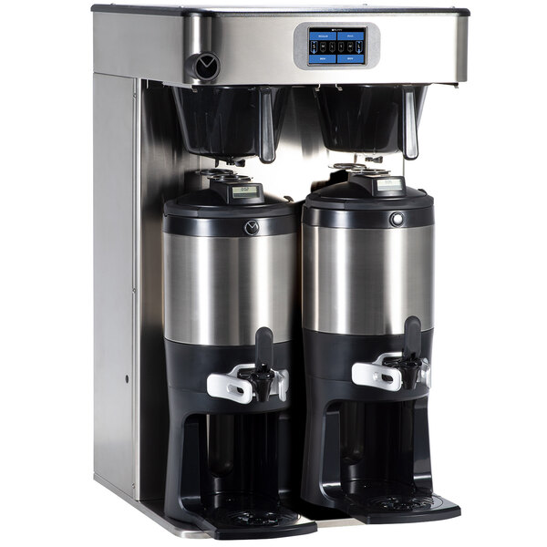 A Bunn Twin Automatic Coffee Brewer with two coffee containers on a counter.