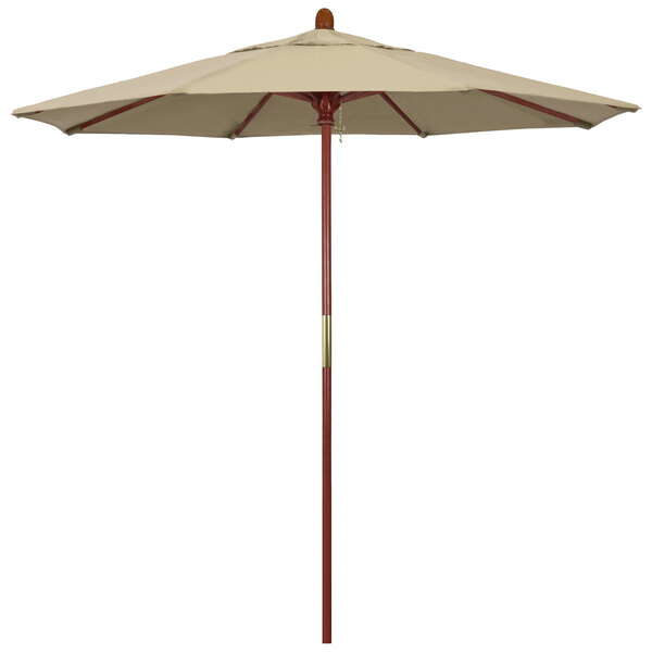 A close-up of a California Umbrella with a Pacifica beige canopy and hardwood pole.