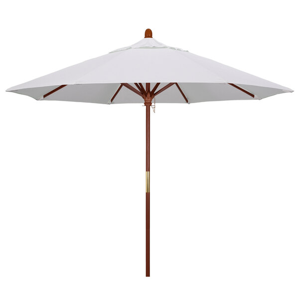 A white umbrella with a natural fabric canopy and a brown wooden pole.