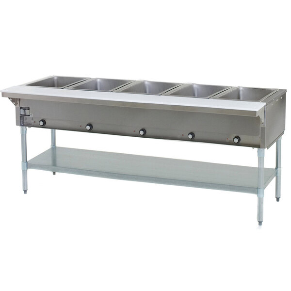 An Eagle Group stainless steel liquid propane steam table on a counter.