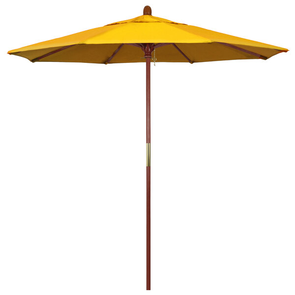 A California Umbrella with a Sunflower Yellow Sunbrella canopy and wooden pole.