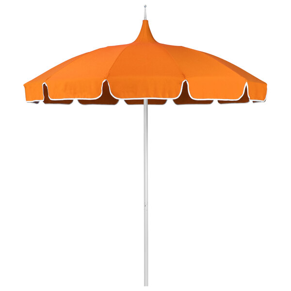 A California Umbrella with orange Sunbrella fabric and white trim.