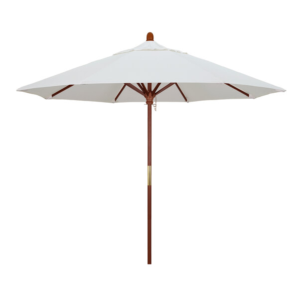 A close-up of a white California Umbrella with a natural Sunbrella canopy and a brown hardwood pole.