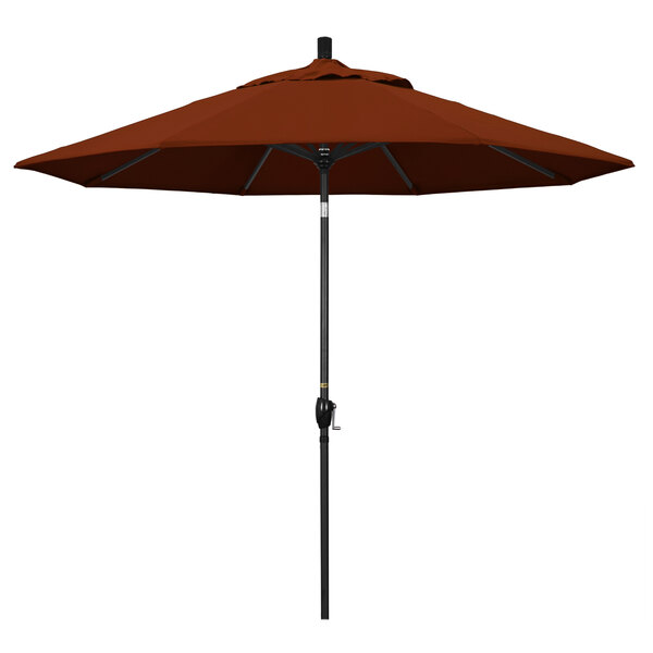 A California Umbrella with a brown canopy and a black pole.