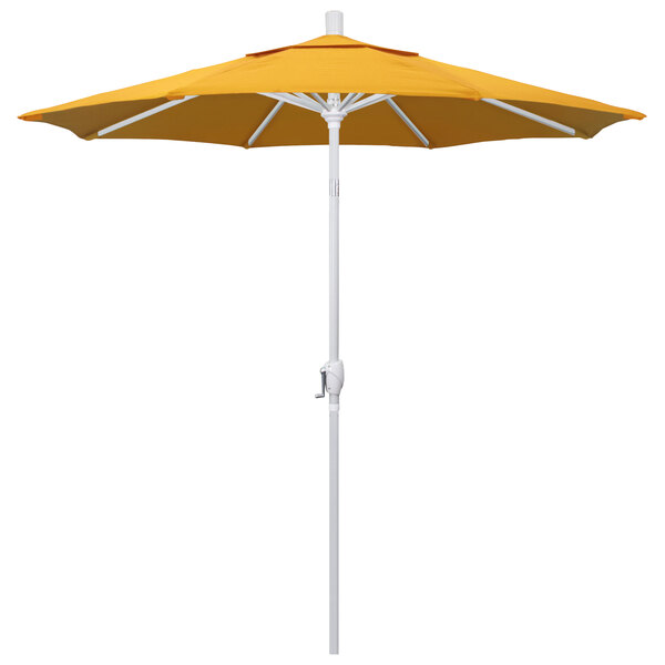 A yellow California Umbrella on a white pole.