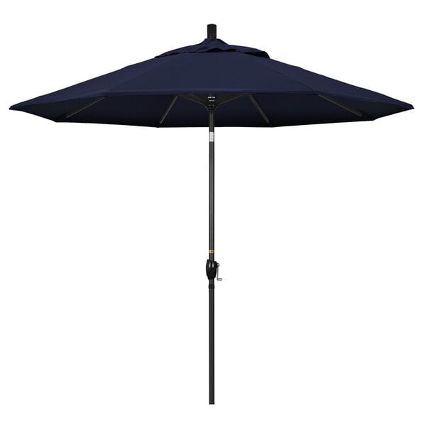 A navy blue California Umbrella with a stone black pole.