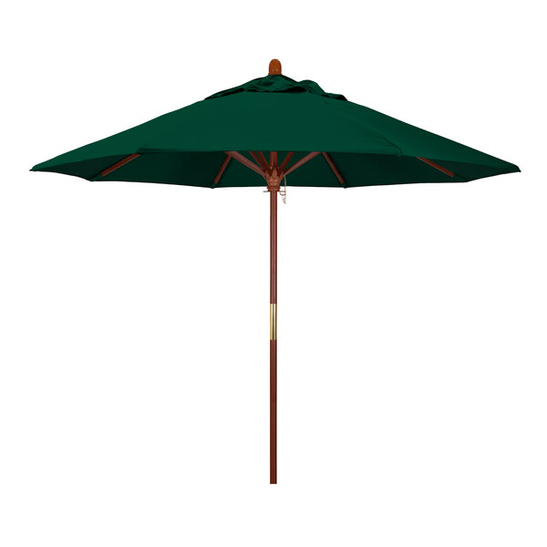 A California Umbrella Grove outdoor table umbrella with a Forest Green Sunbrella canopy and a wooden pole.